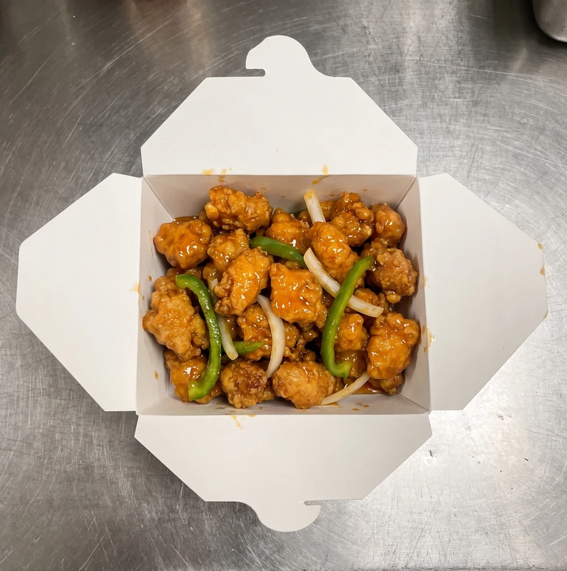 Orange chicken at Spring Wok Express Stoney Creek - crispy chicken in tangy citrus glaze with rice