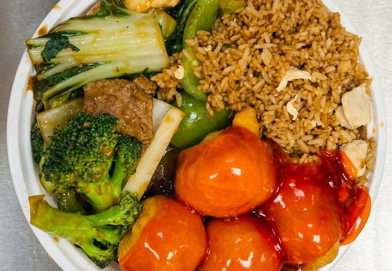 Combination 2 at Spring Wok Express Stoney Creek - egg roll, beef with vegetable, sweet and sour chicken balls and chicken fried rice